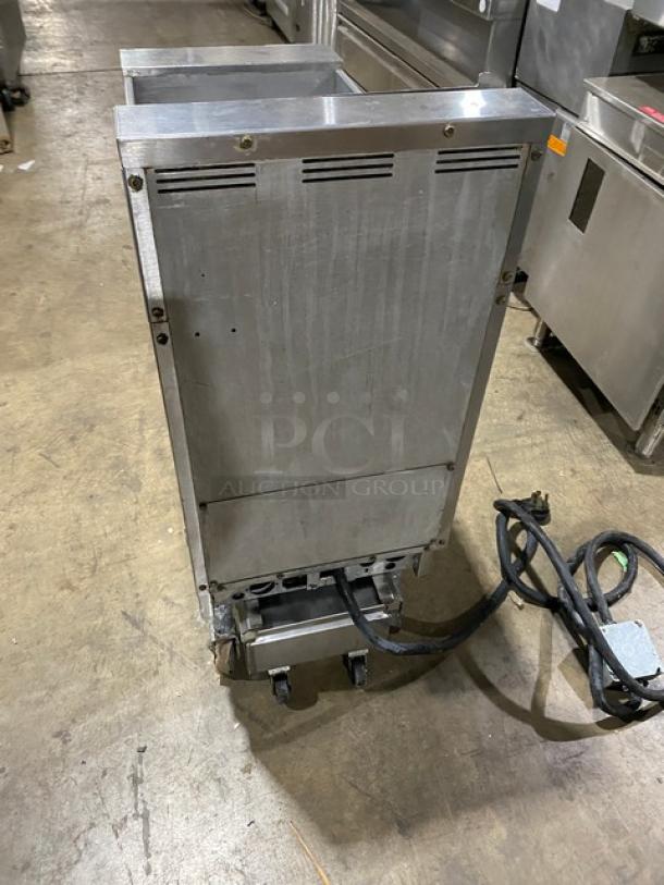 Pitco SFSE14-S stainless steel electric deep fryer, includes back splash, basket hanger, filtration system, on casters.