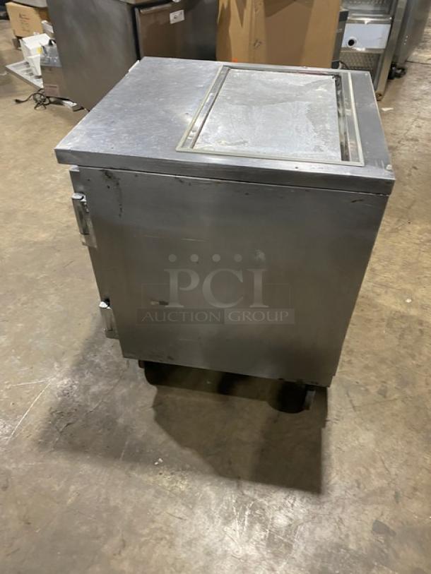Beverage-Air SP27 stainless steel refrigerated prep table, solid single door, on casters, with poly coated rack, 115V, sturdy condition.