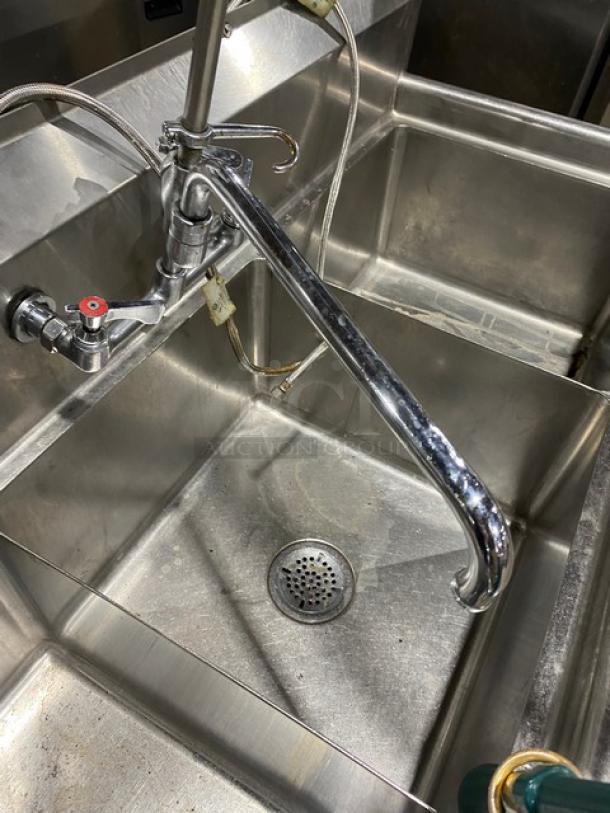Commercial stainless steel 3-compartment dishwashing sink with backsplash, swivel faucet, jet spray, and legs.