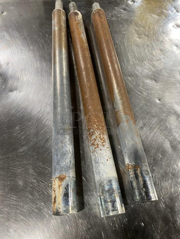 Three stainless steel sink legs with visible rust and wear, suitable for a commercial 3-compartment dish washing sink.