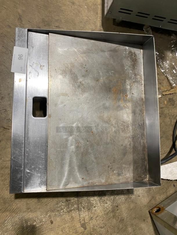 Winco EGD24M stainless steel electric griddle, 24" with back and side splash, used condition, slight discoloration on surface.