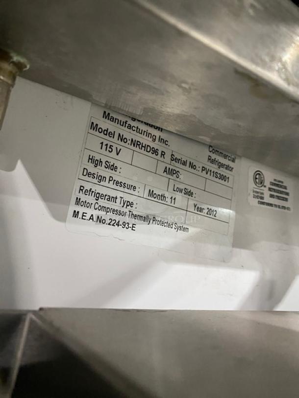 Leader NRHD96R Stainless Steel Refrigerated Display Case, 96", curved glass, rear sliding doors, model info tag shown.