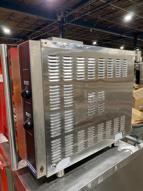 Moffat Turbofan Series stainless steel electric countertop convection oven, with wired oven rack, in good condition.