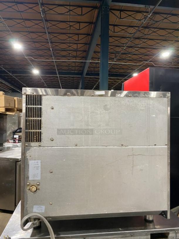 Moffat Turbofan Series stainless steel countertop convection oven, electric-powered, includes wired oven rack, commercial-grade.