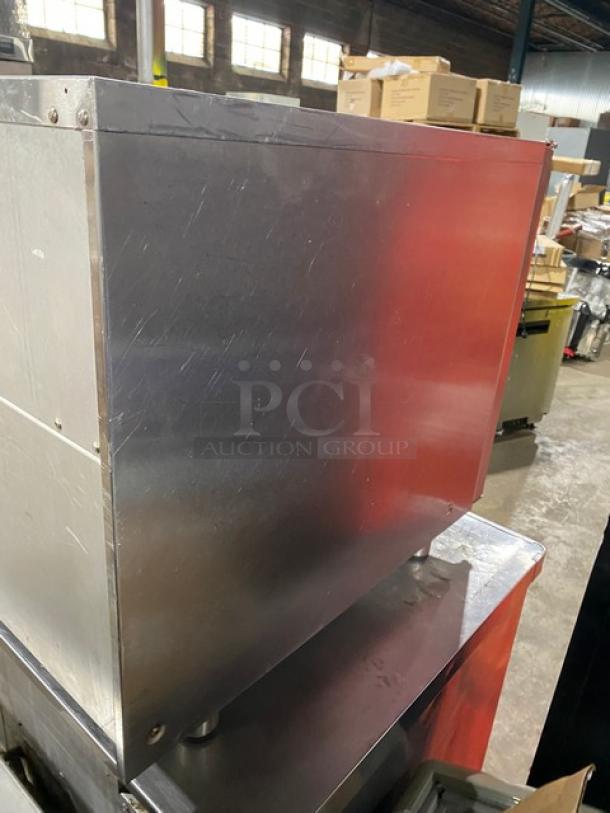 Moffat Turbofan stainless steel countertop convection oven, electric-powered, includes wired oven rack, in used condition.