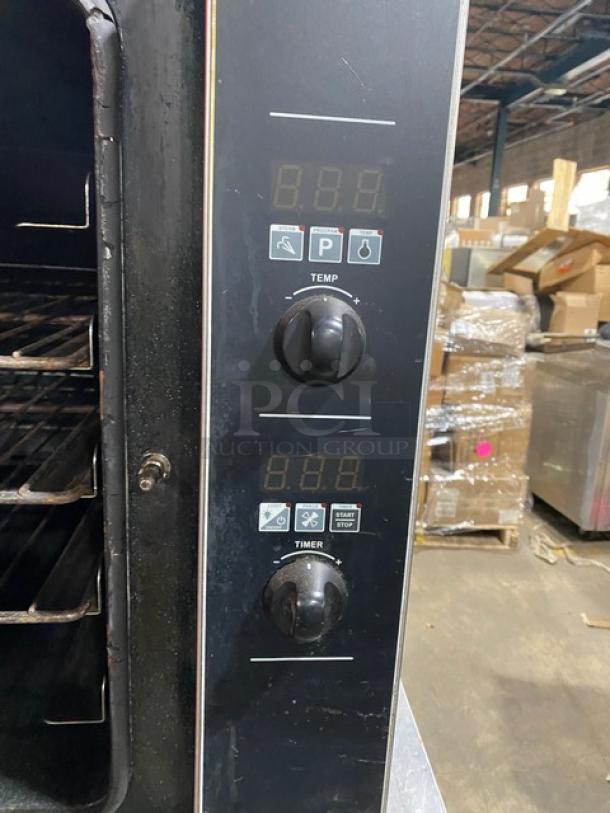 Moffat Turbofan Series stainless steel electric countertop convection oven, includes wired oven rack, in commercial condition.