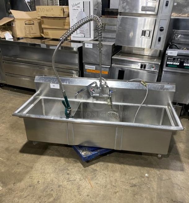 Commercial stainless steel 3-compartment dishwashing sink with backsplash, swivel faucet, jet spray attachment, and legs.