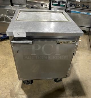 Beverage-Air SP27 stainless steel refrigerated prep table, single door, on casters, with poly-coated wire rack, 115V, 1 phase.