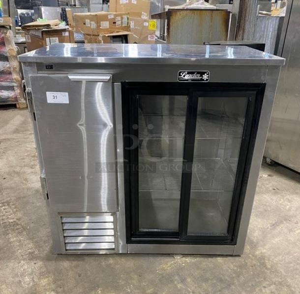 Leader LB48SC stainless steel 2-door refrigerated worktop, glass sliding doors, chrome plated rack, 48", 115V, on casters.