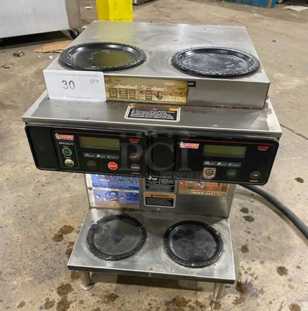 Bunn AXIOM22TWIN commercial coffee brewer, stainless steel, twin model with digital control, 4 warming plates, on legs.