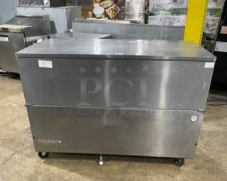 Beverage-Air SM58NS stainless steel milk cooler with poly coated wired rack. Single-access, on casters, 115V, in solid condition.