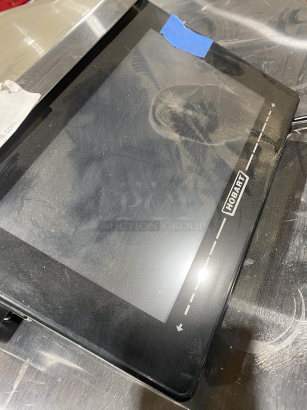 Hobart HT-Series HTi-7LH4 commercial black electric scale/printer combo with stainless steel worktop, operator & customer displays.