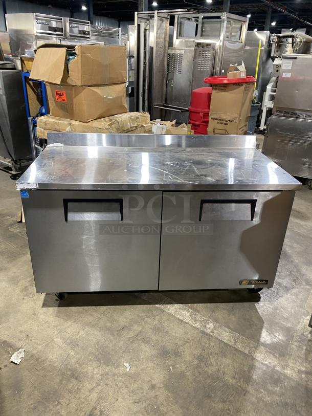 True TWT-60 stainless steel 2-door worktop refrigerator, Energy Star certified, with backsplash, poly-coated rack, on casters.