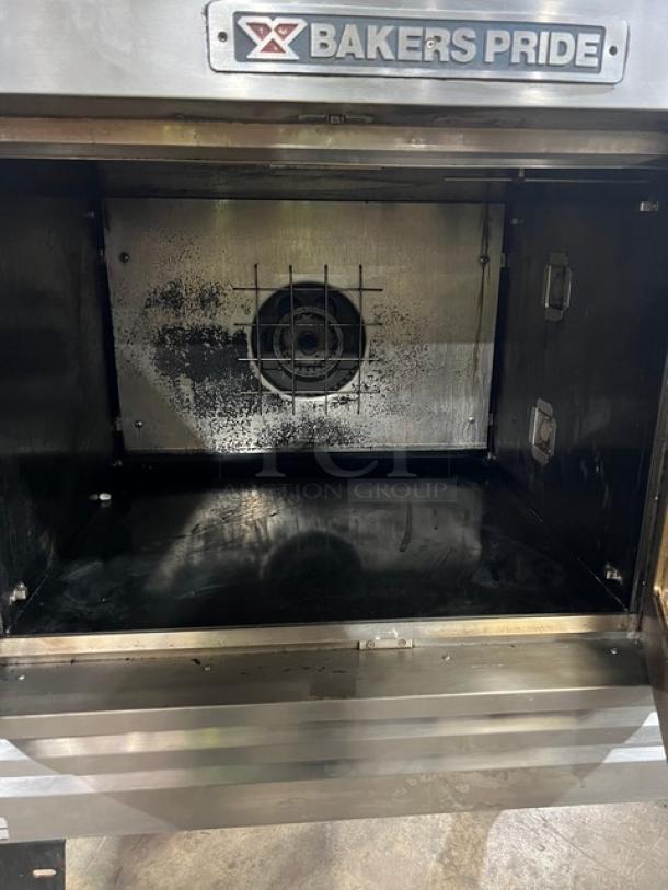 Bakers Pride GDCO-E1 commercial convection oven, single deck, electric, shows interior condition, on casters, branded label.