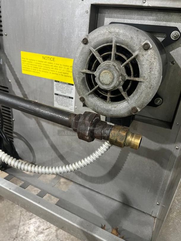 Bakers Pride GDCO-E1 commercial convection oven, electric, single deck, on casters. Visible motor and power connections.