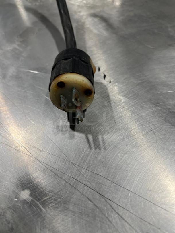 Power plug of Hobart LXi Series commercial dishwasher, electrical connection detail.