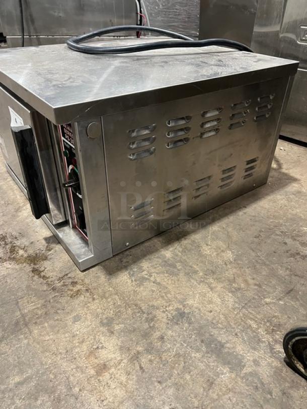 Market Forge PS3E stainless steel electric countertop convection steamer, visible side vents, slightly worn condition.