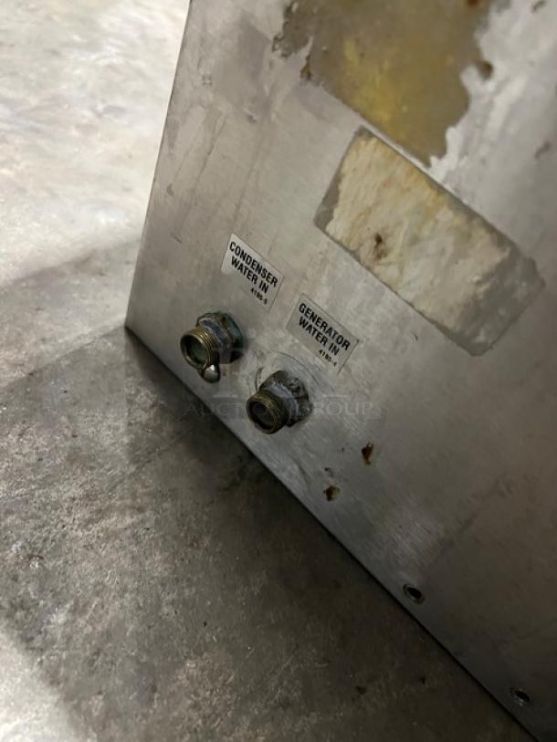 Market Forge PS-3E commercial stainless steel convection steamer with visible water inlet labels, showing signs of wear.