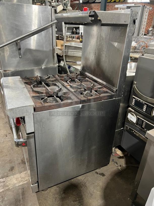 American Range commercial stainless steel 4-burner gas range/oven with backsplash and salamander shelf, on legs.