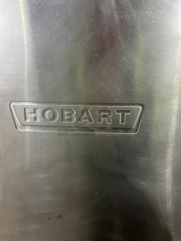 Hobart commercial stainless steel dishwasher, model AM15, embossed logo, high-temperature, electric, 208-240V, 3 phase.