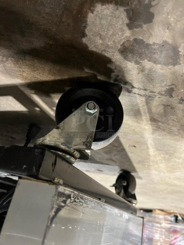 True T-23F stainless steel single door reach-in freezer on casters, features poly coated wired rack, Energy Star certified.