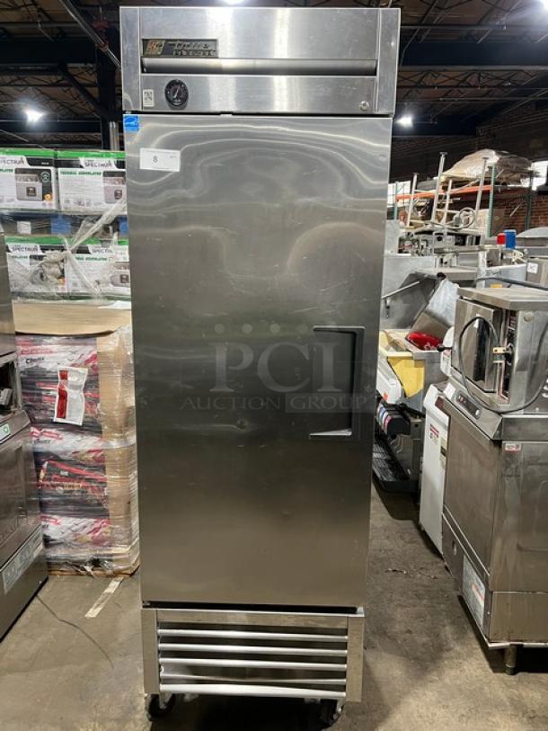 True T-23F commercial stainless steel single door reach-in freezer with poly-coated wired rack, Energy Star, 115V, on casters.