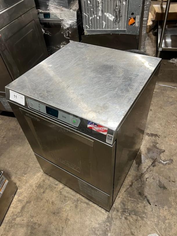 Hobart Advansys LXe Series commercial stainless steel undercounter dishwasher. Durable, used condition, visible control panel.