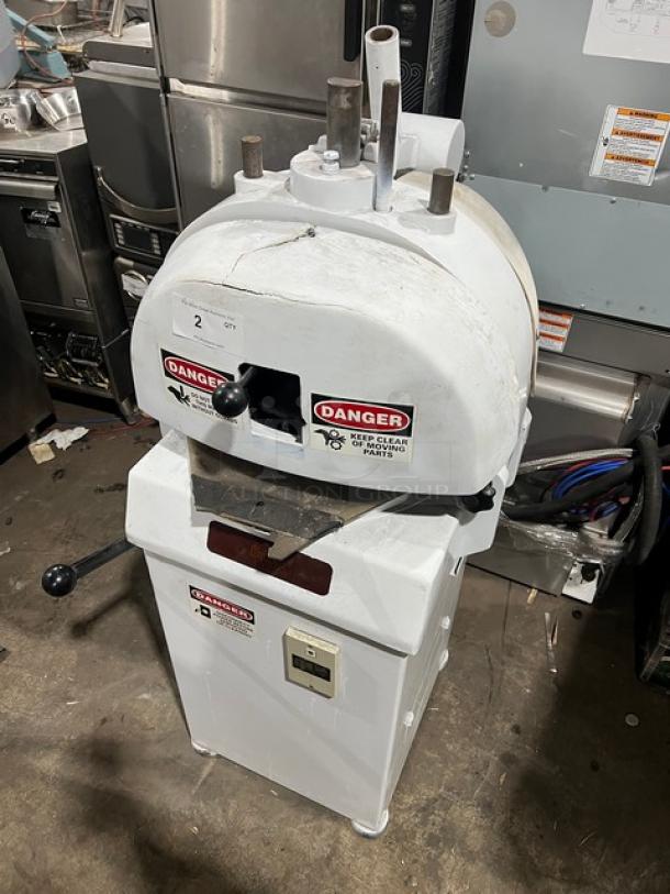 Baker's Aid white electric dough divider/rounder machine, floor model on legs, with visible danger labels, used condition.