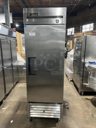 True T-23F commercial stainless steel single door reach-in freezer, Energy Star certified, on casters, with poly coated rack.
