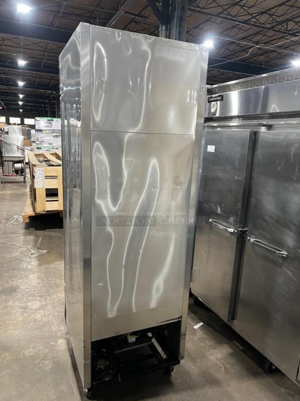 True T-23F commercial stainless steel reach-in freezer, Energy Star certified, on casters, with poly-coated wired rack, 115V.
