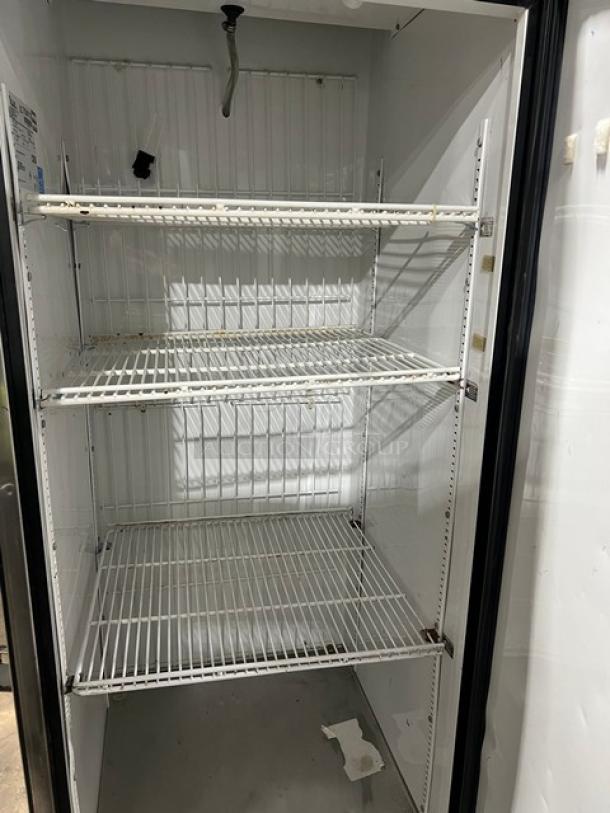 True T-23F commercial stainless steel single door reach-in freezer, Energy Star certified, with poly coated racks and casters.