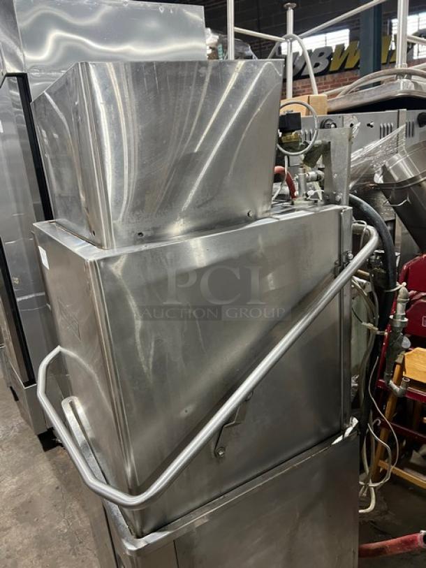 Hobart Advansys Series stainless steel commercial dishwashing machine, door-type, electric powered, on legs, in used condition.