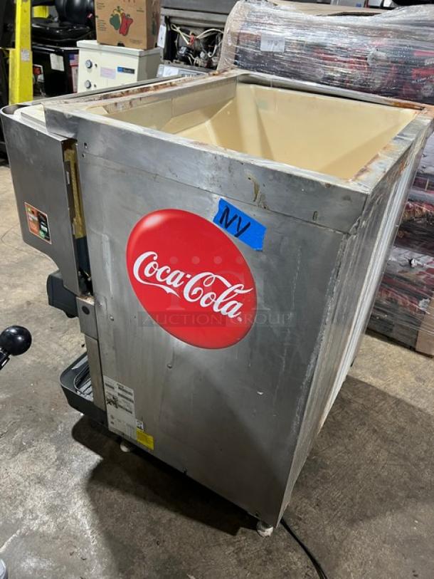Cornelius ED200 Coca-Cola style 8-flavor beverage/ice dispenser, stainless steel, self-serve levers, with drip tray.