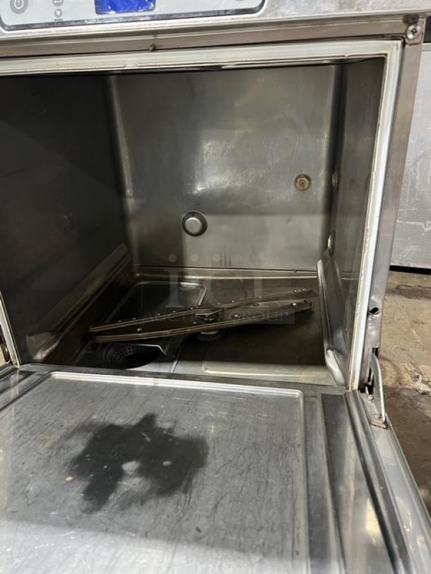 Hobart LXe Series stainless steel undercounter dishwasher, model LXEH, showing interior and wash components, used condition.