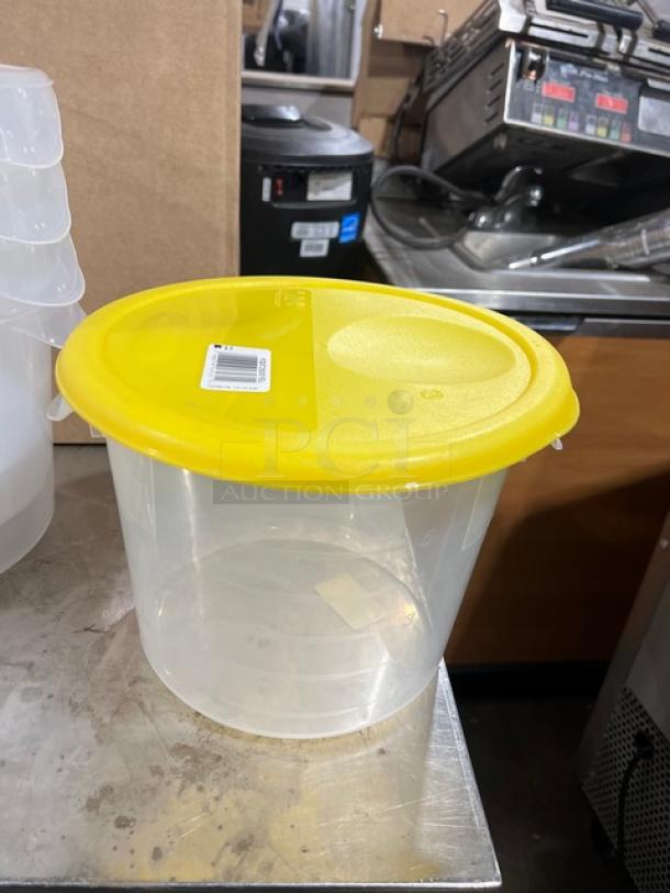 Rubbermaid Commercial 6 Qt. Clear Polycarbonate Food Storage Container with yellow lid. New condition, label visible.