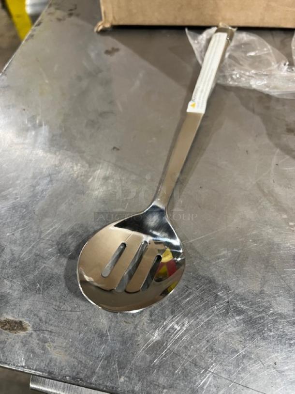Update International stainless steel slotted serving spoon, 11.75", model HB-2/PH, new condition.