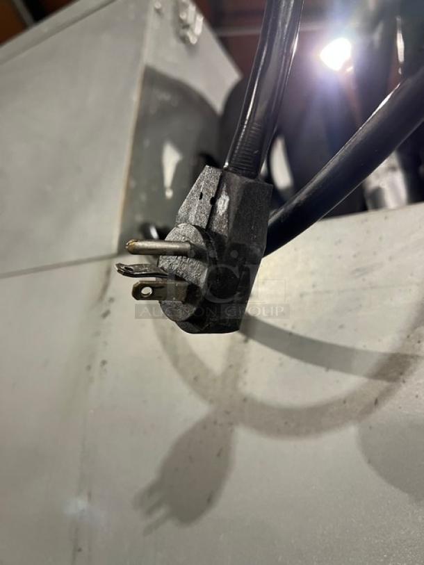 Close-up of plug from Beverage-Air Horizon Series top mount freezer model HF21S, SN 11406169, 115V, 1 phase.