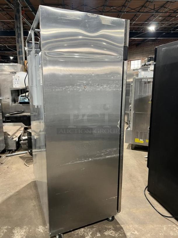 Migali T-Series stainless steel 2-door reach-in freezer, model C-2F, 2017, on casters, with poly coated wired rack.