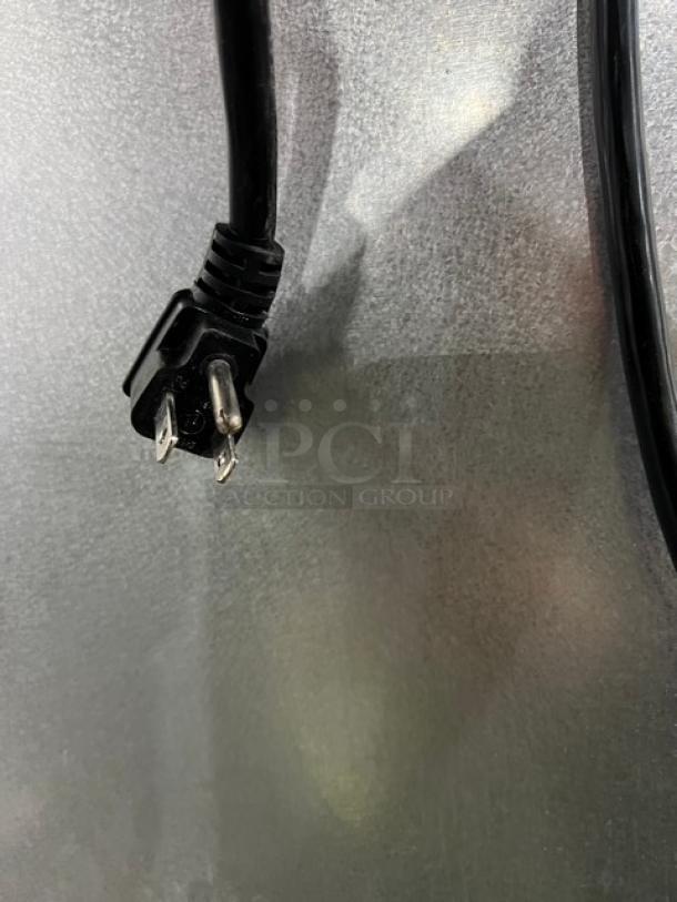 Migali T-Series 2017 commercial freezer plug on stainless steel surface, Model C2F, SN C-2F00317052500920018.