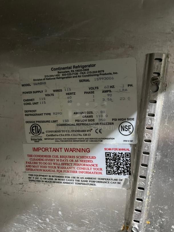 Continental SW48N8 stainless steel 2-door refrigerated prep table; 115V, 1 phase, model and serial tags visible.