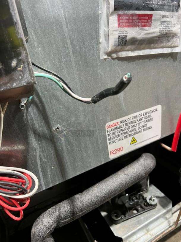 Continental SW48N8 refrigerated prep table wiring and warning label on stainless steel surface. Model SW48N8, 115V, 1 Phase.