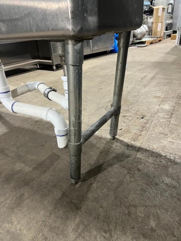 KCS Commercial stainless steel 3-compartment dish washing sink with backsplash. Features sturdy legs and piping. Ideal for kitchens.