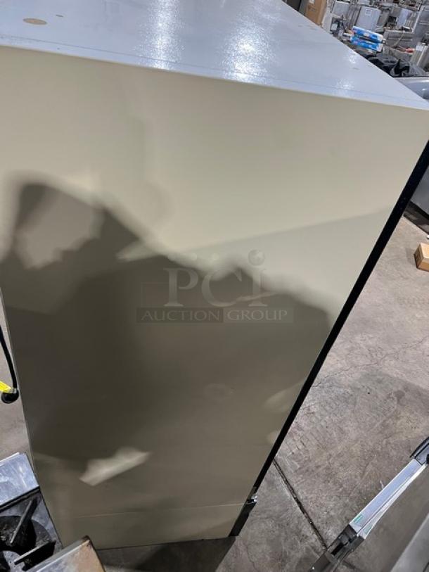 Master-Bilt Commercial Triple Glass Door Refrigerator, Model BLG-74HD, in good condition. Energy Star certified with poly-coated wired rack.