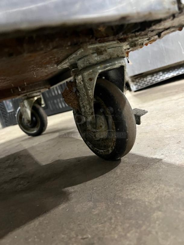 Royal Commercial Stainless Steel 6-Burner Range/Oven, Model RR6, on casters. Natural gas powered with backsplash.