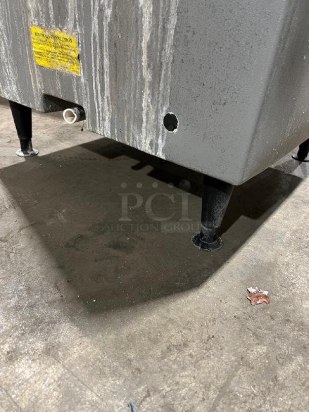 Scotsman Prodigy N0422W-1A/B530P ice machine on legs, stainless steel, water-cooled, electric, commercial-grade, visible wear.