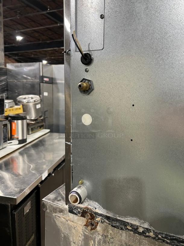 Scotsman Prodigy Series stainless steel water-cooled ice machine, model N0422W-1A/B530P. Shown in stainless kitchen.