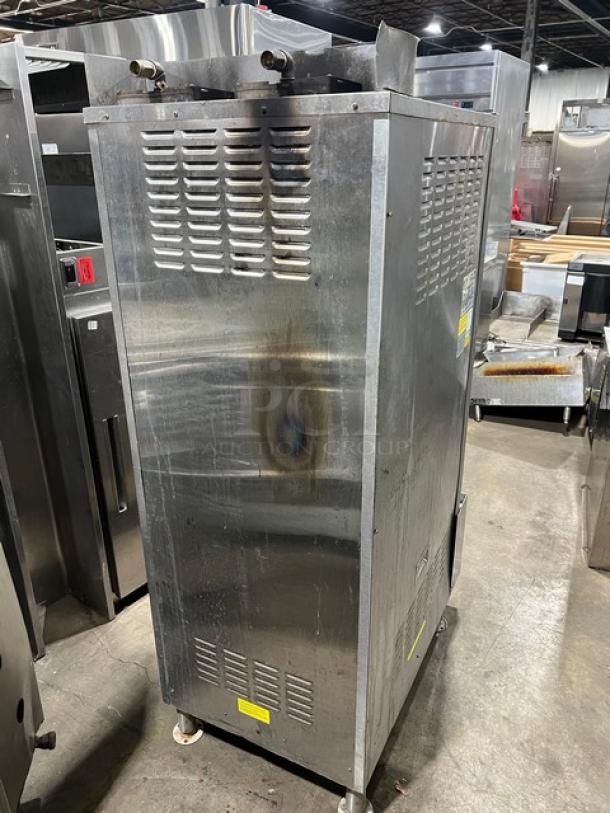 Cleveland Range Gemini Series dual compartment 10-pan convection steamer, model 24CGA10.2, stainless steel, on legs, natural gas, visible wear.