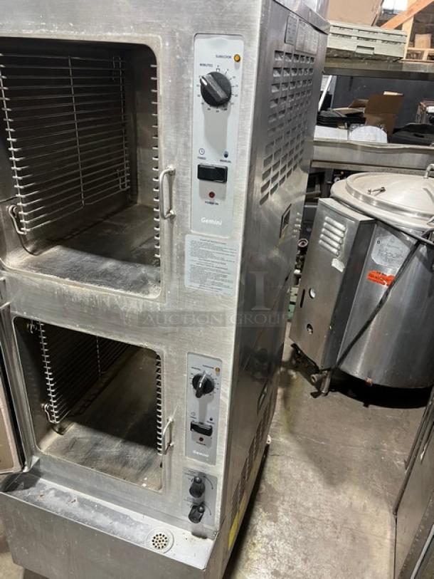 Cleveland Range Gemini Series stainless steel dual compartment 10-pan convection steamer. Model 24CGA10.2, natural gas, 115V, on legs.