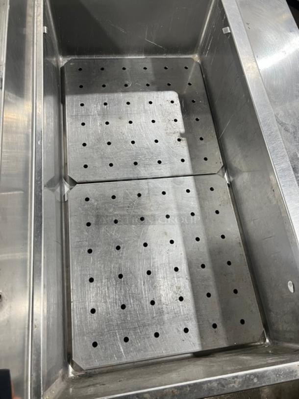 Custom commercial stainless steel bar station with single drawer, triple cocktail areas, ice bin, sink, and drainboard.