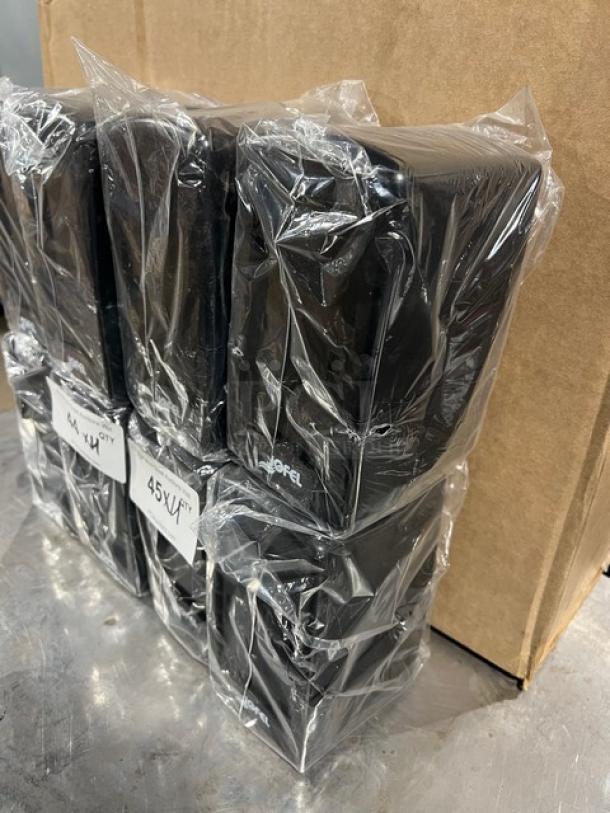 New Jofel black countertop tall-fold napkin dispensers wrapped in plastic. Visible label shows model and quantity.